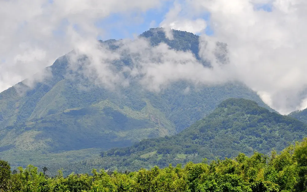 Clouds over the forested slopes of Mount Talinis in Negros Oriental